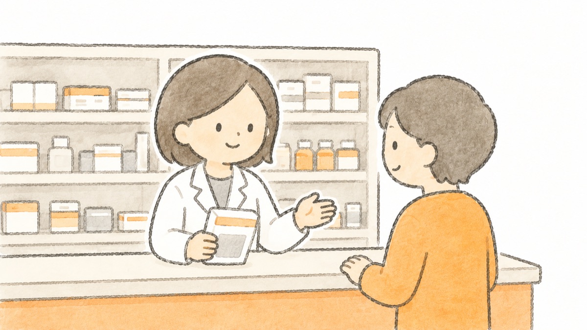カウンターごしに薬剤師と話しているところ